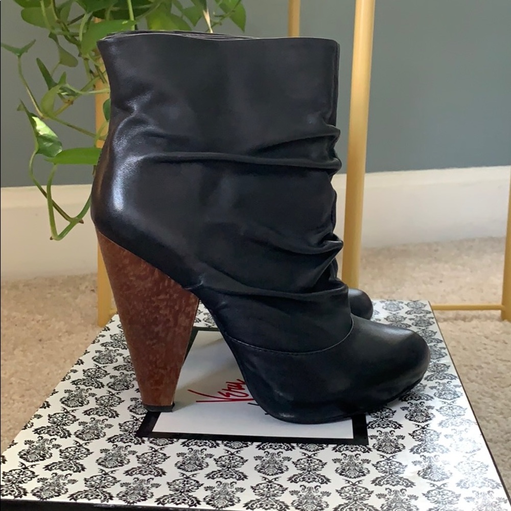 Very Volatile! Awesome slouched ankle boots!
